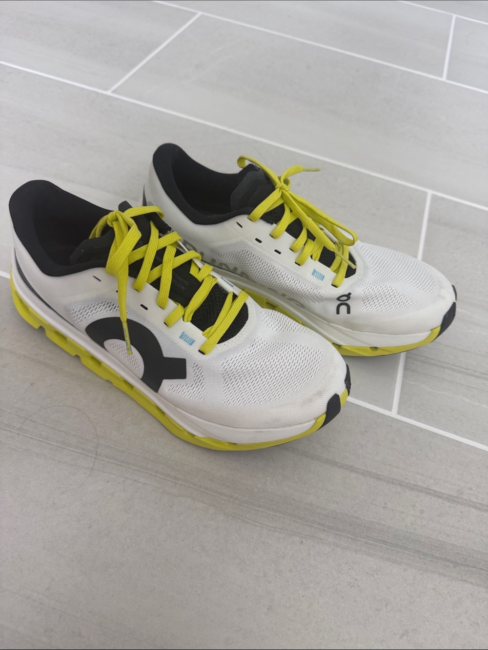 Oncloud Running Sneakers in White and Yellow with Black Accents